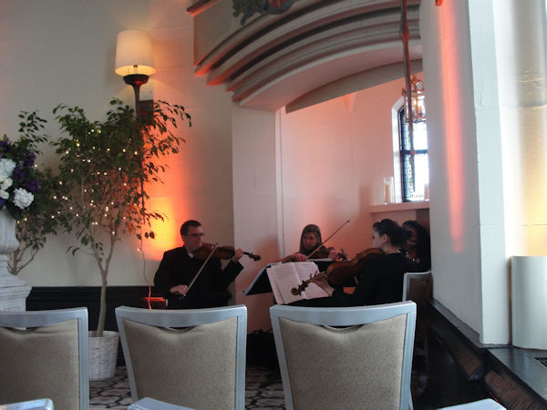A string quartet playing preludes