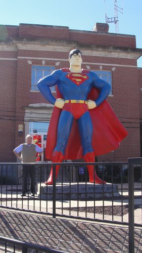 Superman standing beside superman